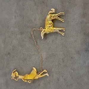 Dog walking brooch